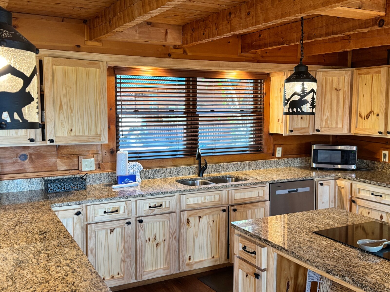 Custom faux wood blinds in a rustic cabin kitchen